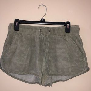 Green shorts made out of 100% Rayon.